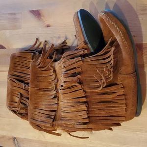 Minnetonka, brown, calf height fringe moccasin boots. Size 9